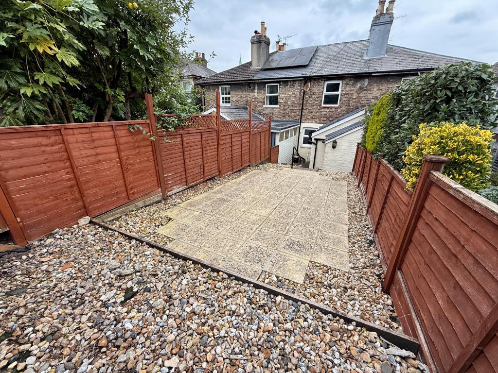 Lot: 160 - MID-TERRACE HOUSE FOR REFURBISHMENT - Patio to rear